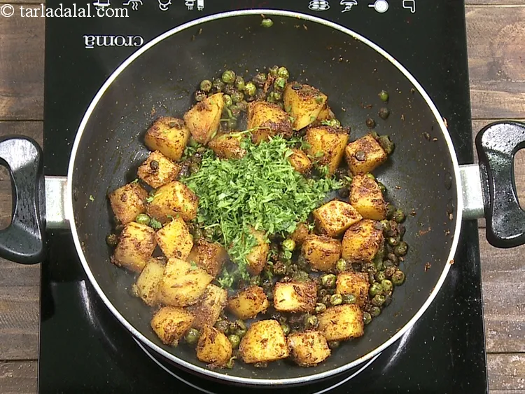 Step 22 – Add 2 tbsp&nbsp;finely&nbsp;<a href="https://www.tarladalal.com/glossary-chopped-coriander-783i">chopped coriander (dhania)</a>.