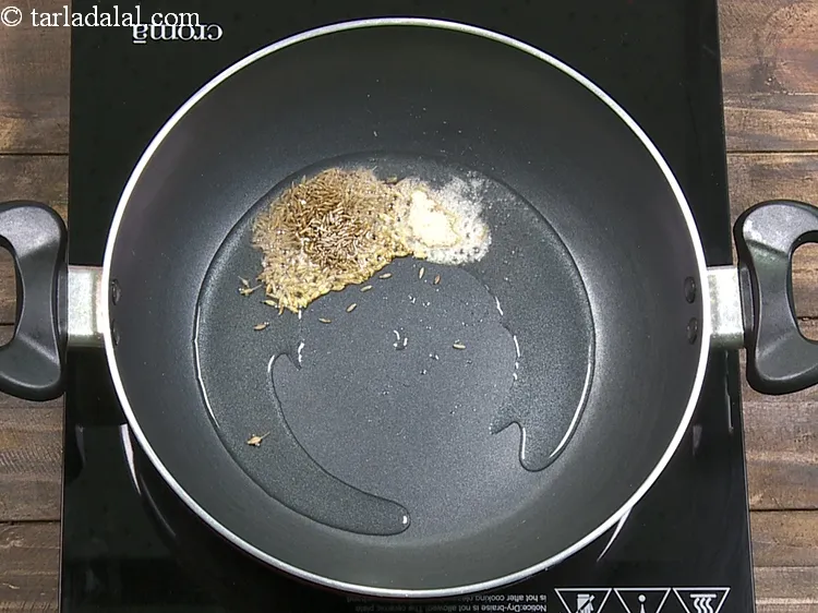 Step 5 – Add 1/4 tsp&nbsp;<a href="https://www.tarladalal.com/glossary-asafoetida-hing-113i">asafoetida (hing)</a>.