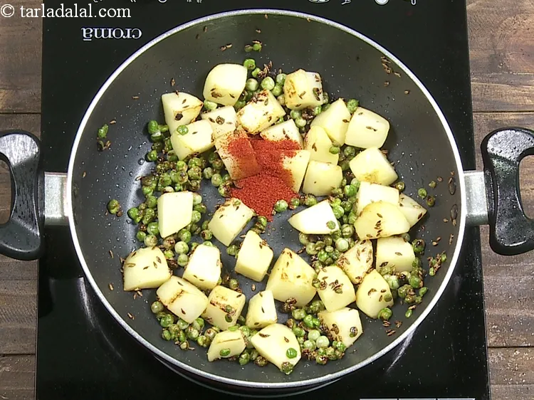 Step 11 – Add 1 tsp&nbsp;<a href="https://www.tarladalal.com/glossary-chilli-powder-red-chilli-powder-339i">chilli powder</a>.