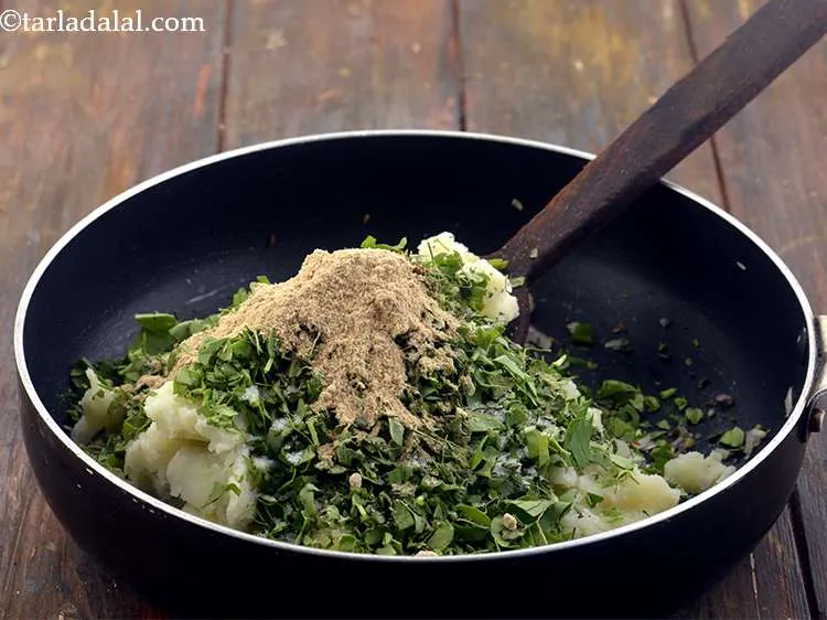 Step 12 – Then add the dry mango powder for a slightly tangy taste to the <strong>aloo methi …