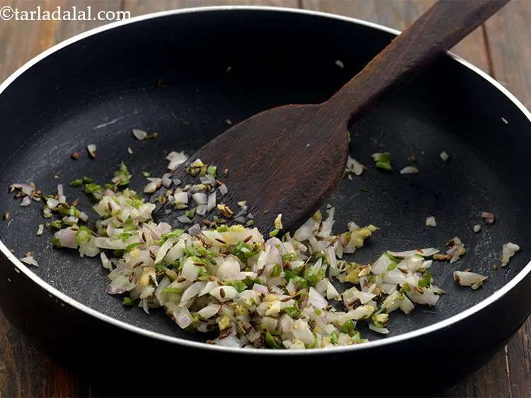 Step 6 – Saute the onion on a medium flame for 1 minute or till they turn translucent.