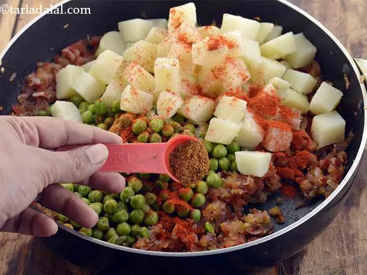 Step 13 – Add the <em>garam masala</em>. For the <strong>Punjabi aloo matar gravy recipe</strong>, make use of the …