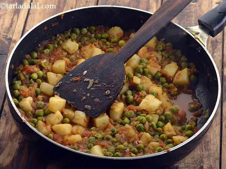 Step 16 – Cook the <strong>aloo mutter subzi </strong>for around 2 minutes or till it comes to a …