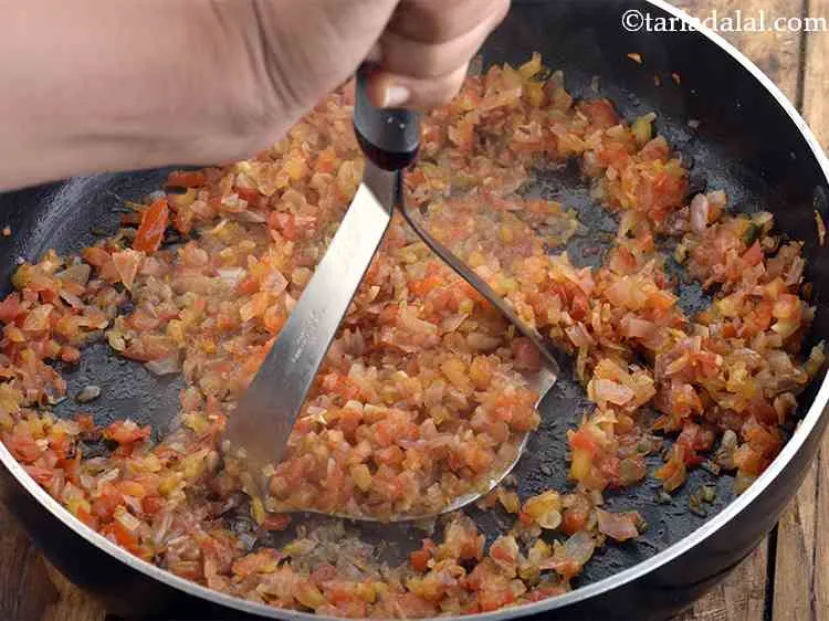 Step 9 – Mash lightly using a potato masher.
