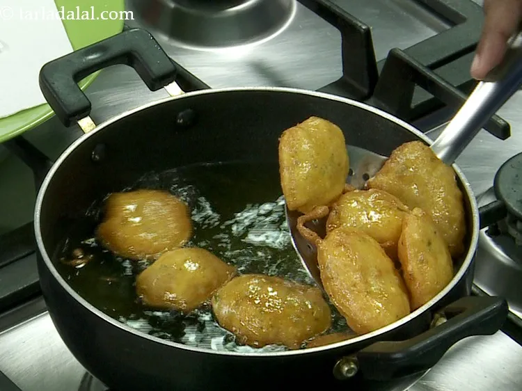 Step 22 – Gently flip and cook on the other side till golden and crispy. Turn over a …