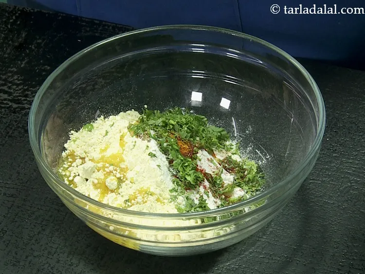 Step 13 – Add warm oil. It helps in making <strong>aloo pakora</strong> crisp, lighter and prevent them from …