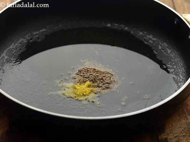 Step 4 – Add asafoetida and saut&eacute; on a medium flame for 30 seconds.