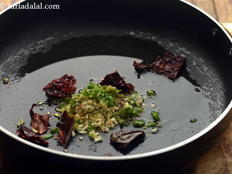 Step 8 – Add red chillies. Break the dried red chilies before adding to the pan for more …