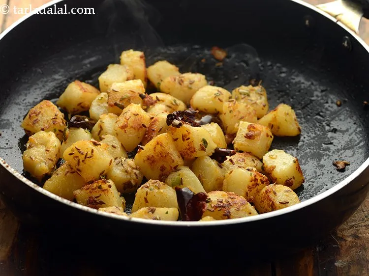 Step 11 – Toss gently and cook on a medium flame for 5 minutes, while stirring occasionally.