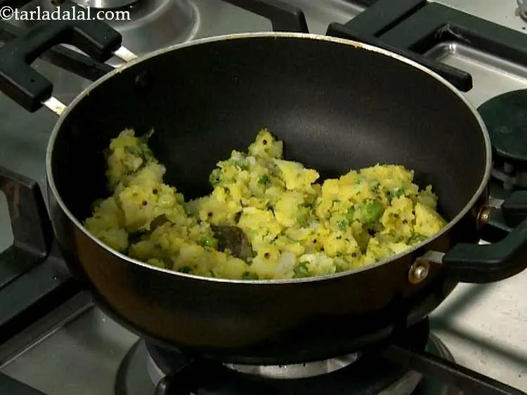 Step 13 – Mix well and cook on a medium flame for another minute.