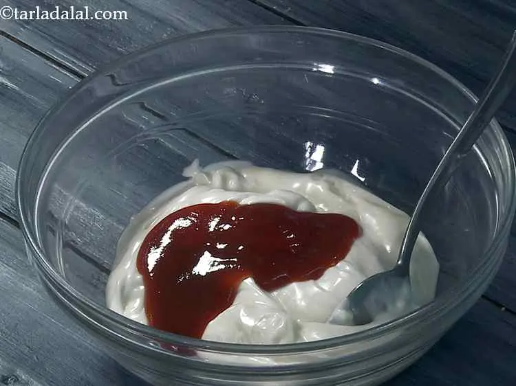 Step 15 – In a bowl take mayonnaise, add tomato ketchup to it.