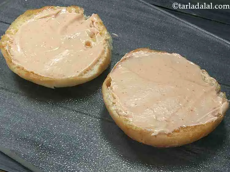 Step 20 – Spread a little of the prepared spread on each half and spread it evenly. Instead …