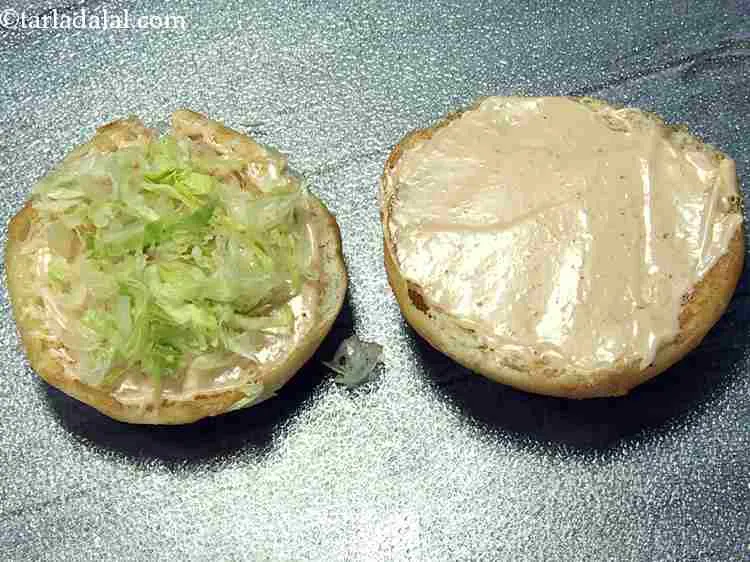 Step 21 – Put ? cup of lettuce on the lower burger bun halve. If lettuce leaf is …