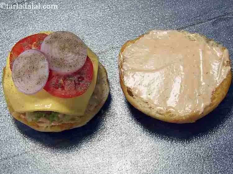 Step 24 – Then put 2 tomato slices, 2 onion slices and finally sprinkle a little salt and …