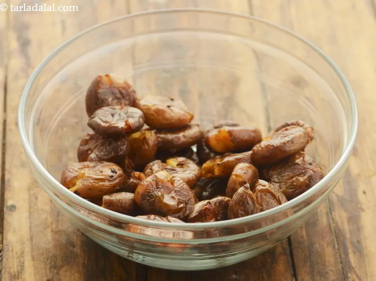 Step 22 – Transfer <strong>aloo took</strong> into a deep bowl.