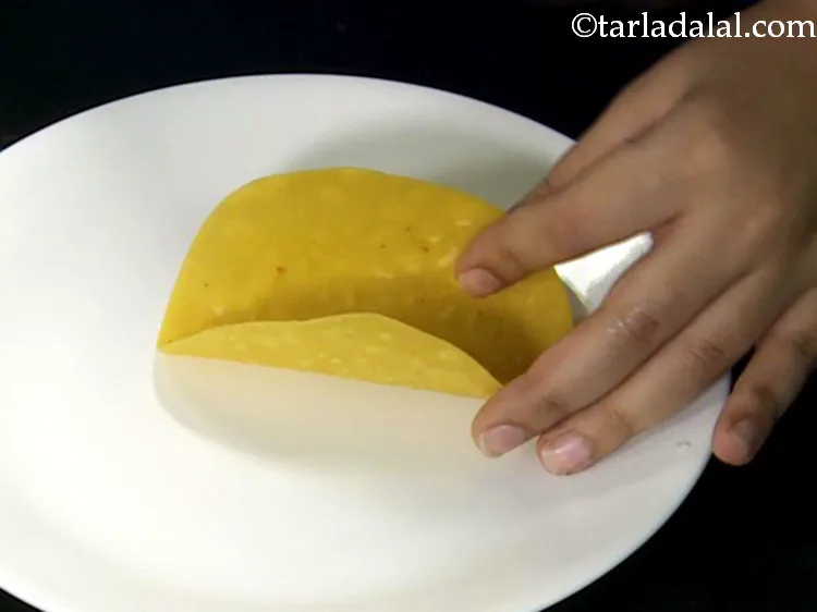 Step 6 – To make hard taco shells at home follow our <a href="/Taco-Shells-39838r">taco shell detailed recipe</a>.&nbsp;