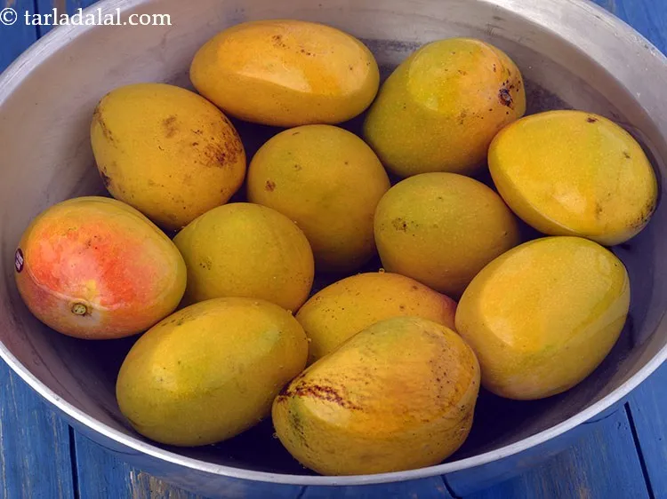 Step 17 – Then soak the mangoes without peeling them in a deep bowl with enough water. Soak …