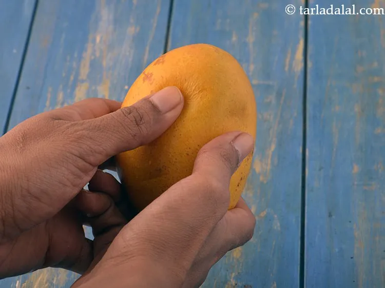 Step 10 – Take a mango, press it evenly from all the sides till it turns soft uniformly. …