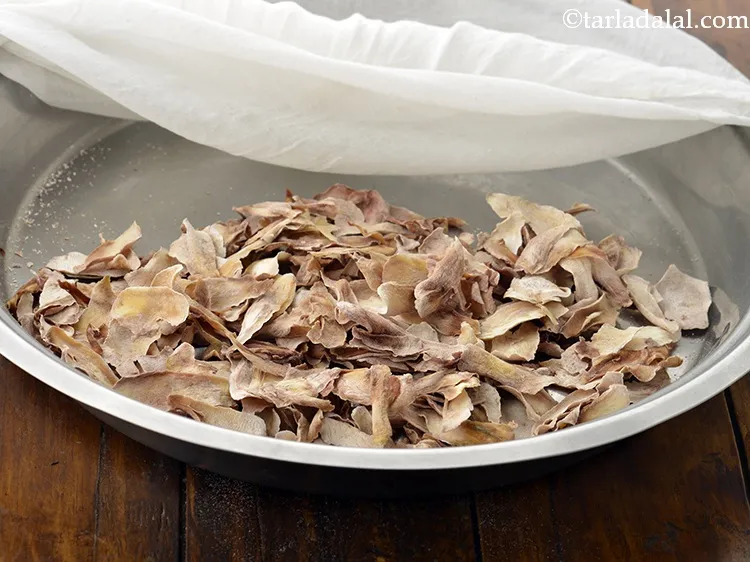 Step 9 – Repeat step 5 to dry it for 1 more day or till the mango slices …