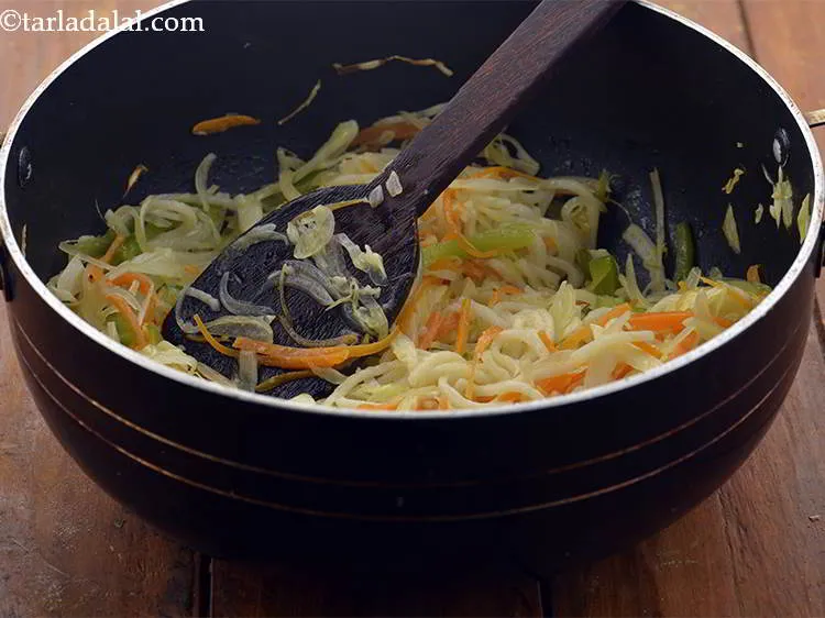 Step 24 – Mix well and saut&eacute; on a medium flame for 1 minute.