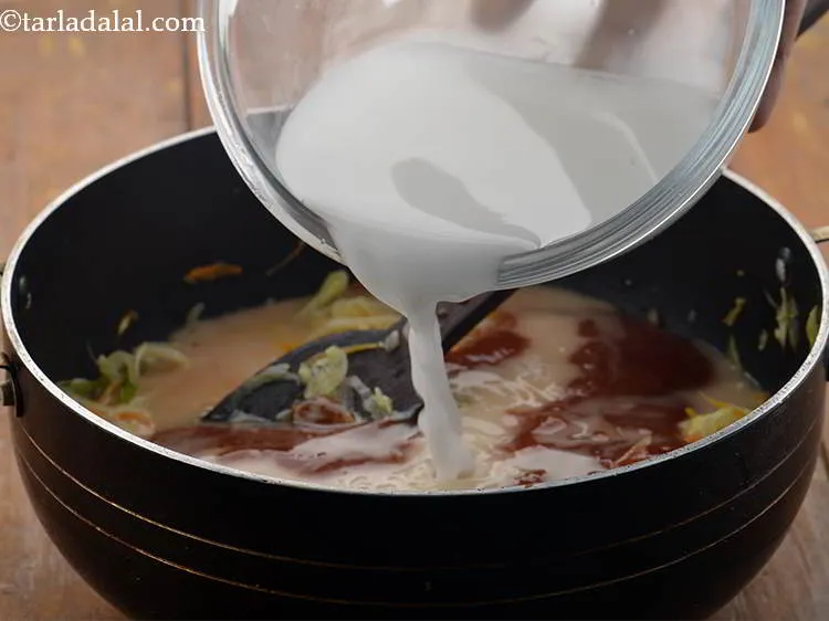 Step 24 – Now add the cornflour-water mixture.