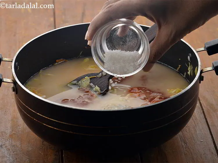 Step 29 – Add sugar. <strong>American Chop Suey</strong> is pleasantly sweet hence we add the sugar.