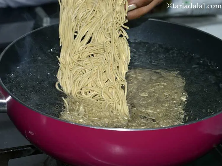 Step 8 – Add the noodles and let them boil till they are 70-80% cooked.