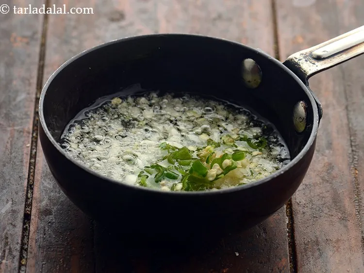 Step 19 – Add the green chillies.