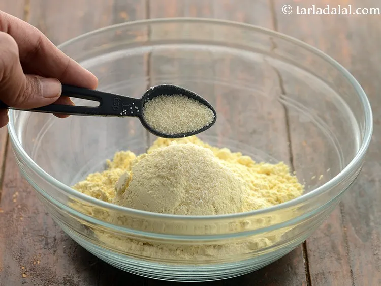 Step 3 – Add semolina. Rava gives a beautiful grainy texture and mouthfeel to khaman.