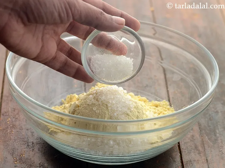 Step 5 – Add sugar. The distinct flavor and texture of <strong>khaman dhoklas</strong> come from the sugar syrup …