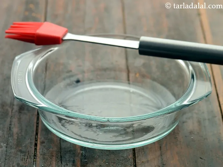 Step 12 – To make <strong>khaman in a microwave</strong>, grease 150 mm. (6&rdquo;) diameter microwave-safe container using oil.