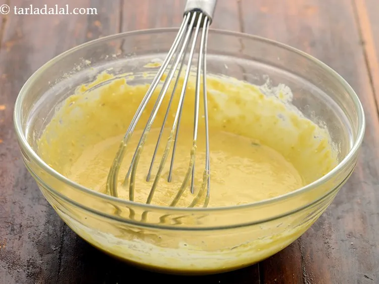 Step 8 – Mix well to make a batter of pouring consistency. Adjust consistency of the batter using …