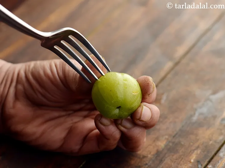 Step 4 – Prick them with a fork at regular intervals.