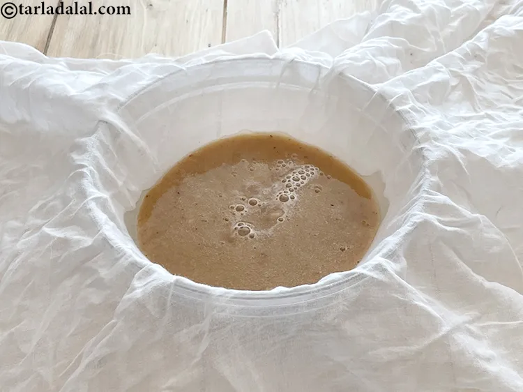 स्टेप 9 – इमली के पल्प को मलमल के कपड़े का उपयोग करके …