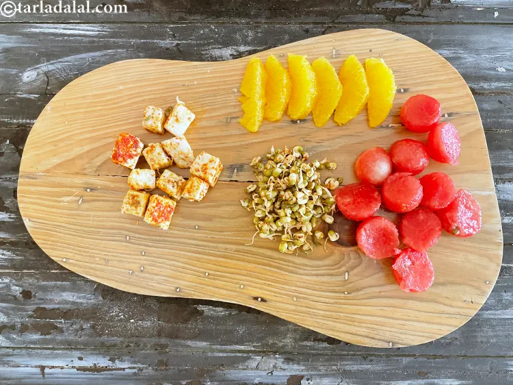 Step 32 – Add&nbsp;<meta charset="UTF-8" />1/2 cup&nbsp;<a href="glossary-watermelon-balls-37i">watermelon (tarbuj) balls</a>.&nbsp;Watermelon is&nbsp;<a href="https://www.tarladalal.com/recipes-for-healthy-recipes-low-calorie-weight-loss-383">low in calories</a>&nbsp;and full of water, thus …