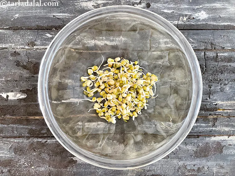 Step 23 – In a bowl put&nbsp;<meta charset="UTF-8" />2 tbsp&nbsp;<a href="glossary-sprouted-moong-moong-sprouts-988i">sprouted moong (whole green gram)</a>.