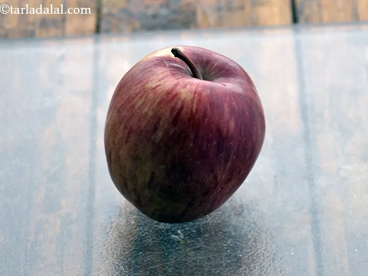 Step 2 – To make the <strong>apple and oats milkshake</strong>, wash an apple and place on the chopping …