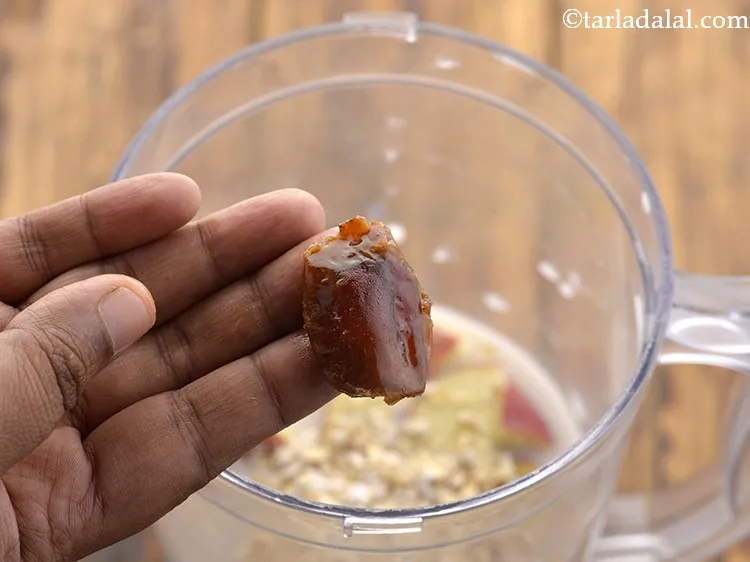 Step 12 – We have also used dates in the recipe. So after adding oats, add 1 seedless …