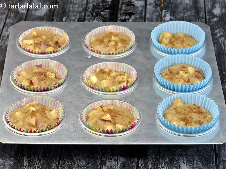 Step 19 – Sprinkle little cinnamon powder on each muffin mould.