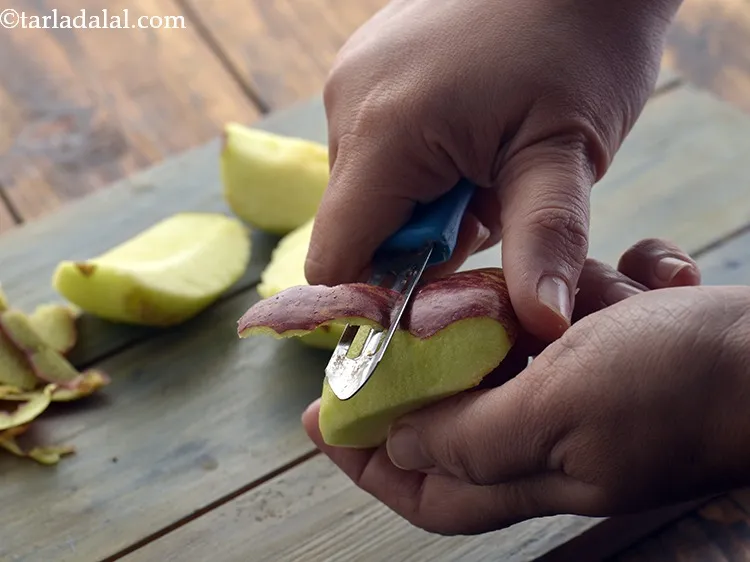 Step 12 – Peel the apple with a sterilized peeler. Peel it very well so that no fibrous …