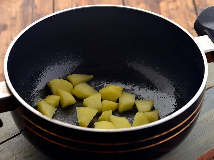 Step 18 – Once the apples are cooked, keep them aside to cool slightly. Most of the water …