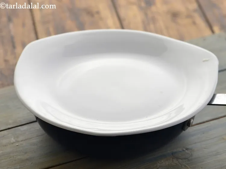 Step 18 – Cover the pan with a lid and keep it aside for 10 minutes. This will …