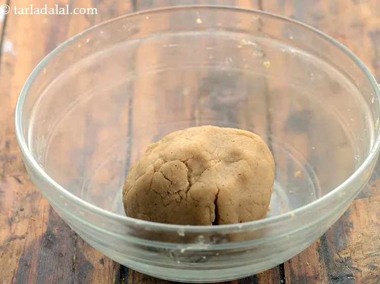 Step 12 – Knead into a semi-stiff dough. You can add chopped nuts and dry fruits to the …