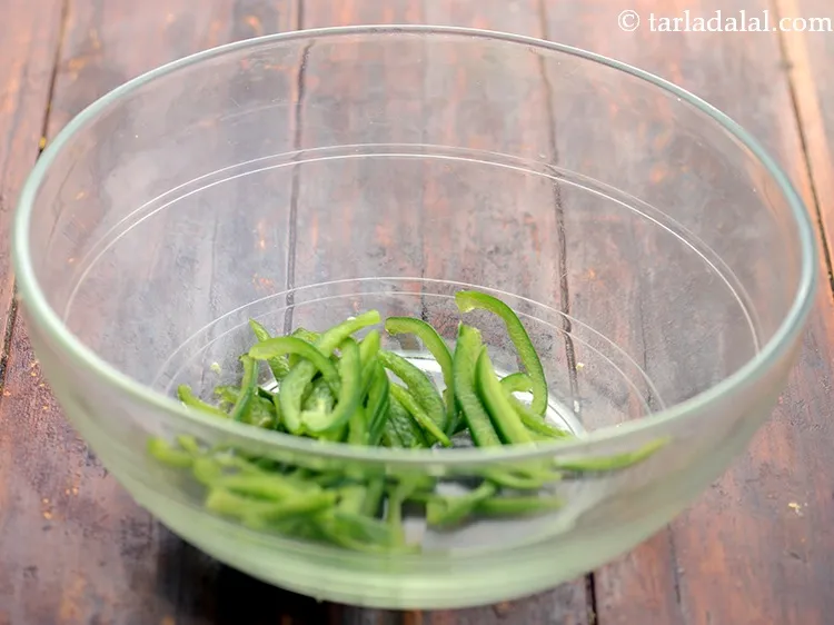 Step 15 – To prepare the&nbsp;<strong>avocado salad with cucumber and tomato</strong>, in a deep bowl add capsicum.&nbsp; For …