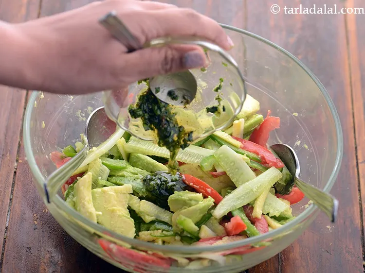Step 21 – Add the dressing of&nbsp;<strong>cucumber tomato avocado salad.</strong>