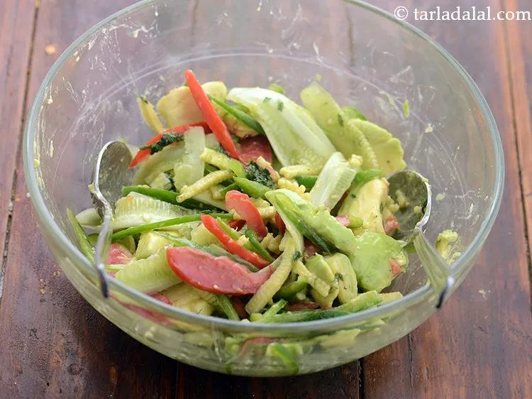 Step 22 – Toss well and our&nbsp;<strong>avocado salad for shiny hair recipe</strong><strong>&nbsp;</strong>is ready.