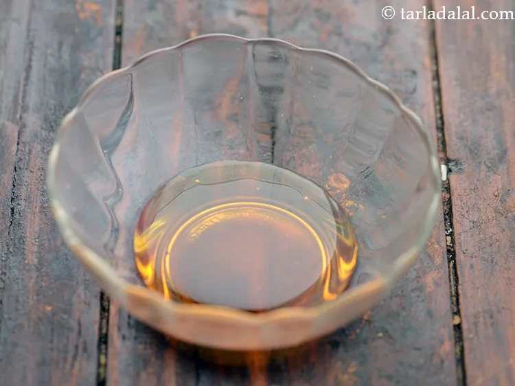 Step 9 – To prepare the dressing for&nbsp;<strong>healthy avocado salad for lunch</strong>, in a small bowl take honey. …