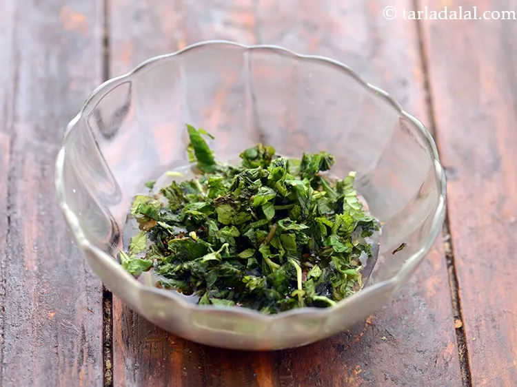 Step 11 – Add finely chopped mint leaves for a refreshing flavour. Mint and tomato increase the&nbsp;<a href="https://www.tarladalal.com/recipes-for-Pregnancy-Folic-Acid-Rich-447" …