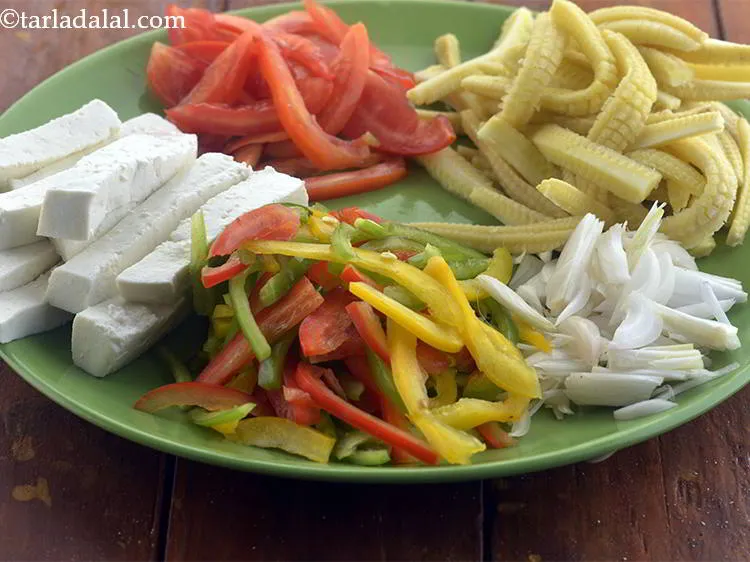 Step 2 – Before making the <strong>Baby corn and Paneer Jalfrazie</strong>, keep all the vegetables ready and keep …