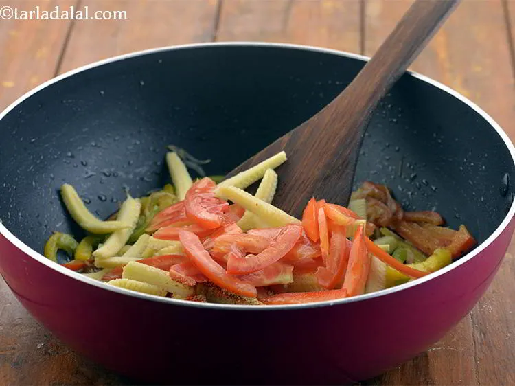 Step 11 – Add the tomatoes as well.&nbsp;